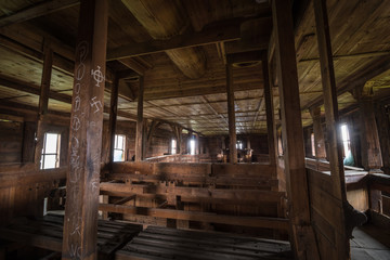Fototapeta na wymiar Abandoned old wooden Catholic church