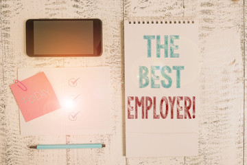 Writing note showing The Best Employer. Business concept for created workplace showing feel heard and empowered Square spiral notebook marker smartphone sticky note on wood background
