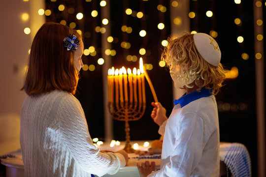 Kids celebrating Hanukkah. Festival of lights.