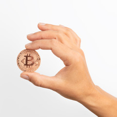 Hand with bitcoin