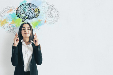 Businesswoman crossed her fingers for success