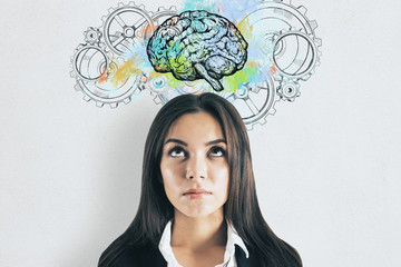 Young businesswoman thinking