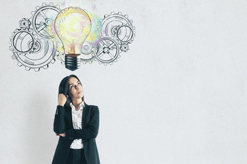 Young businesswoman thinking