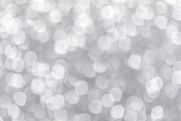 Abstract defocused silver lights bokeh background pattern