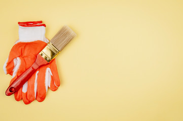 House painter tool on a yellow background.