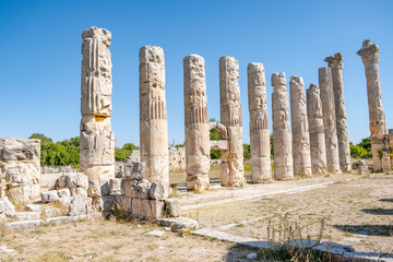 With blue sky,Marble columns of Temple of Tyche, goddess of fortune, Roman, late first century AD, Olba, (Uzuncaburc), Silifke, Mersin,Turkey