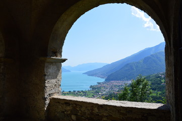 Peglio village in the mountains (Gravedona, Italy). June 2019.  The medieval church. Panoramic view from the church site.