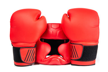 Boxing helmet and boxing gloves isolated on white. The concept of sport and active leisure....