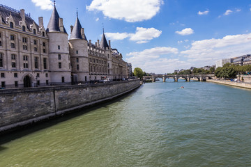 The Seine River, Pont Neuf and Quai de l'Horloge on the sunny day