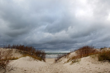 empty beach and stormy sky