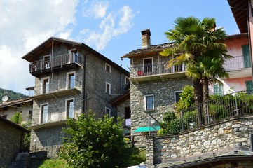 Peglio village in the mountains (Gravedona, Italy). June 2019. Peglio is a commune in Italy. Located in the Marche region, in the province of Pesaro e Urbino. The population is 472 people.