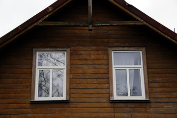 old window in a wooden house