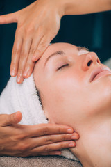 Obraz na płótnie Canvas Woman Receiving Facial Fitness Lifting Massage