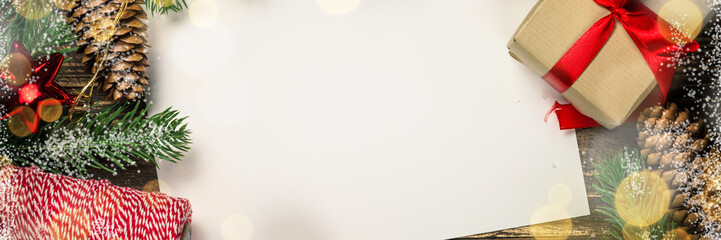 Christmas flat lay background with present and decorations.