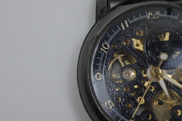 Mechanical skeleton watch on a white background