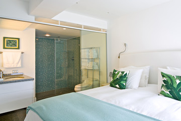 Interior of modern room with bathroom, beach apartment.