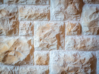 Stone texture background. Geometric masonry. Square stones. Close-up