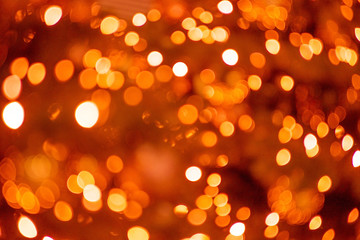 Fototapeta premium The glare of the holiday lights. Festive Christmas background.
