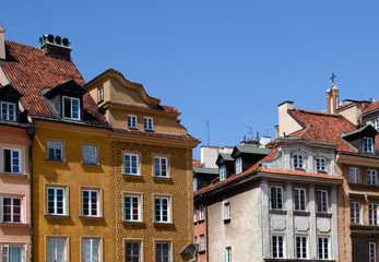 Buildings of the old city in Warsaw. Roofs and walls of medieval houses.