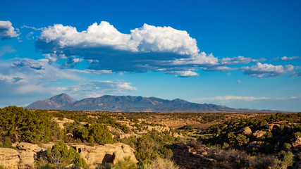 The Abajo Mountain range dominates the skyline across the sagebrush landscape from the Hovenweep National Monument, Utah