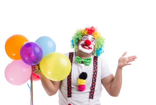 Funny clown with balloons isolated on white background