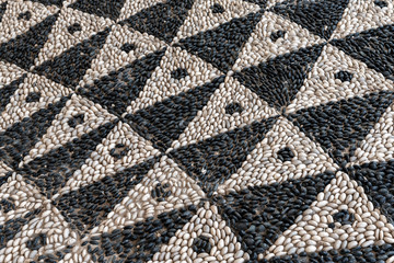 Decorative pebble mosaic on the streets of Rhodes. Greece