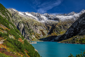 Obraz premium Gelmer Lake near by the Grimselpass in Swiss Alps, Gelmersee, Switzerland, Bernese Oberland, Switzerland
