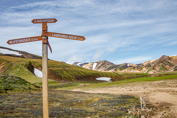 Signpost showing direction to the famous Laugavegur multiday trail in Icelandic Landmannalaugar...