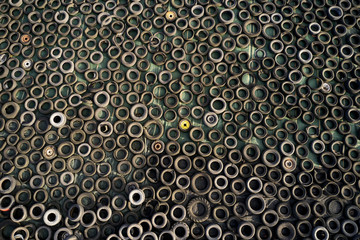 tons of old used tyres in a mix