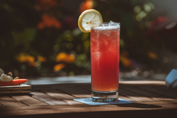 Red lemonade in a tall glass