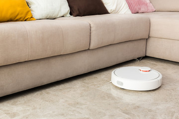 Robot vacuum cleaner cleaning the room