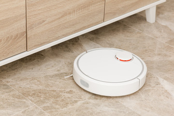 Robot vacuum cleaner cleaning the room