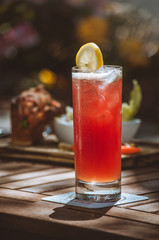 Red cocktail with breakfast