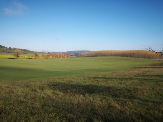 Obraz premium landscape with autumn hill and blue sky