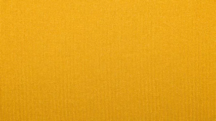 Fotobehang Yellow texture of binding fabric.Yellow fabric background.Yellow fabric. Background with a textured surface. © begun1983