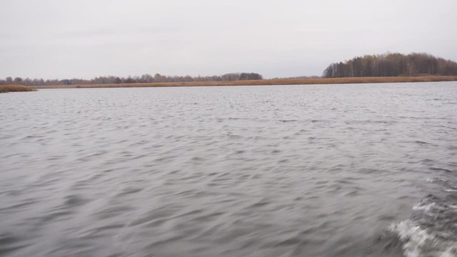 Autumn river, nature, view from the boat. Fishing.