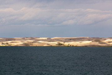 Cloudy sunset on a mountain lake. Mongolia