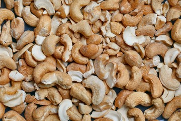 Cashews in a pile close up background, salted