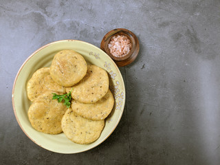 Mathri, an Indian snack made of  whole wheat flour or all purpose flour with fenugreek leaves and Carom seeds.