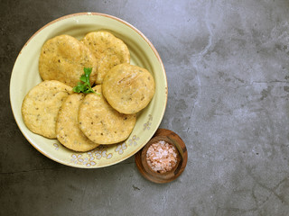 Mathri, an Indian snack made of  whole wheat flour or all purpose flour with fenugreek leaves and Carom seeds.