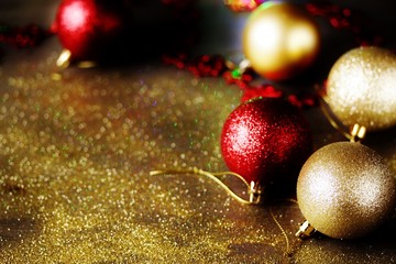 Festive background Christmas and New Year with shiny Christmas balls, lights of garlands and glitter.  copy space. space for text