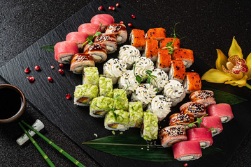 tasty sushi on the black background
