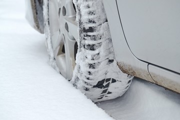 Trails of wheels in fresh snow