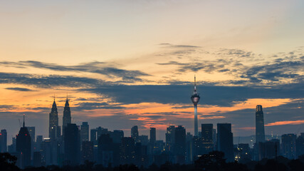 beautiful sunrise over kuala lumpur city skyline