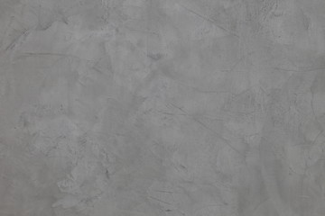 Dark grey cement wall with rustic natural texture for abstract background and design purpose