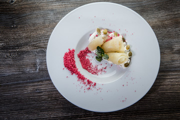 top view on modern restaurant dessert decorated with pumpkin seeds