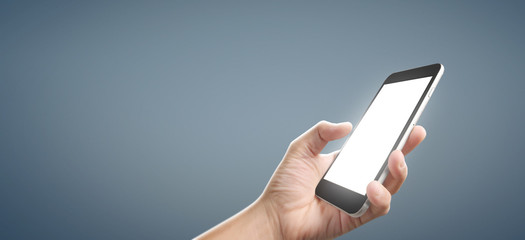 Man hand holding smartphone device and touching screen