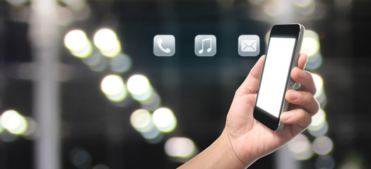 Man hand holding smartphone device and touching screen