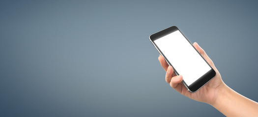 Man hand holding smartphone device and touching screen