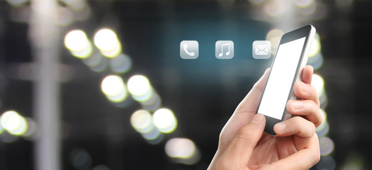 Man hand holding smartphone device and touching screen